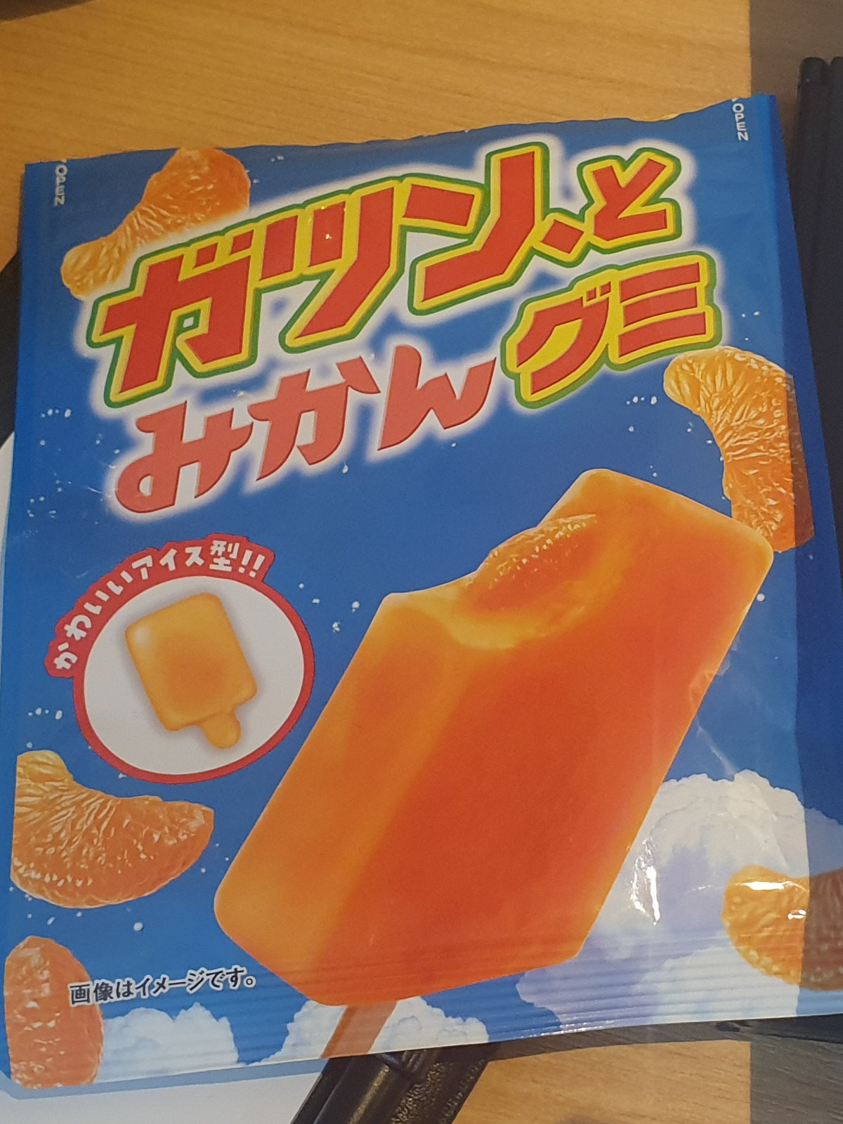 photo of a bag of orange pop candy